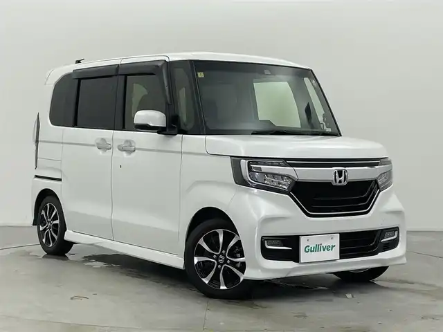 ホンダ Ｎ ＢＯＸ カスタム G L ホンダセンシング 富山県 2019(平31)年 1.8万km プラチナホワイトパール ワンオーナー/純正ナビ(AM/FM/DVD/CD/BT)/フルセグTV/バックカメラ/レーダークルーズコントロール/レーンキープアシスト/衝突軽減ブレーキ/両側パワースライドドア/前方ドライブレコーダー/後方コーナーセンサー/横滑り防止装置/純正AW/社外AW付スタッドレスタイヤ車載/社外フロアマット/オートライト/LEDヘッドライト/サンシェード/取扱説明書/保証書