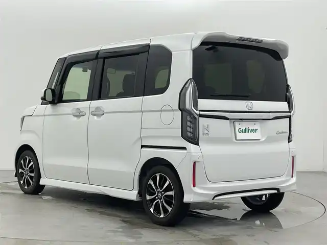 ホンダ Ｎ ＢＯＸ カスタム G L ホンダセンシング 富山県 2019(平31)年 1.8万km プラチナホワイトパール ワンオーナー/純正ナビ(AM/FM/DVD/CD/BT)/フルセグTV/バックカメラ/レーダークルーズコントロール/レーンキープアシスト/衝突軽減ブレーキ/両側パワースライドドア/前方ドライブレコーダー/後方コーナーセンサー/横滑り防止装置/純正AW/社外AW付スタッドレスタイヤ車載/社外フロアマット/オートライト/LEDヘッドライト/サンシェード/取扱説明書/保証書