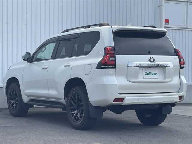 トヨタ ランドクルーザー プラド TX Lパッケージ 愛媛県 2018(平30)年 7.7万km ホワイトパールクリスタルシャイン 純正ナビ/AM/FM/CD/DVD/BT/フルセグTV/全周囲カメラ/サンルーフ/現状RAＹsアルミホイール/積込純正AW付スタッドレスタイヤ/BF Goodrich All-Terrain T/A/トヨタセーフティセンス/電動格納サードシート/D/N席パワーシート/D/N席シートヒーター/D/N席シートエアコン/ブラックルーフレール/ヘッドライトウォッシャー/フロントワイパーデアイサー/ブラインドスポットモニター/純正ドアバイザー/排気ガス浄化スイッチ/ステアリングスイッチ/電格ミラー/ベージュレザー