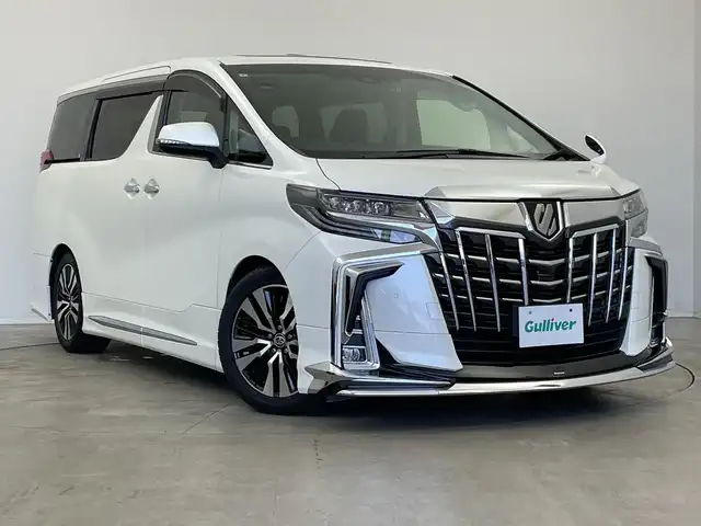 トヨタ アルファード S Cパッケージ 新潟県 2020(令2)年 2万km ホワイトパールクリスタルシャイン 禁煙車/純正メモリナビ/（BT/FM/AM/フルセグTV）/バックカメラ/ステアリングスイッチ/ステアリングヒーター/レザーシート/パワーシート/シートヒーター/エアシート/シートメモリー/オットマン/フリップダウンモニター/デジタルインナーミラー/純正三眼LEDオートヘッドライト/ツインムーンルーフ/ブラインドスポットモニター/前後ドライブレコーダー/モデリスタフルエアロ/シーケンシャルウィンカー/サンシェード/電格ミラー/ドアバイザー/ETC/取扱説明書/保証書/整備記録簿