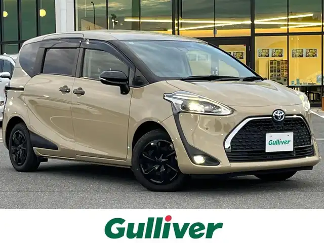 トヨタ シエンタ ハイブリッド G セーフティエディションⅡ 奈良県 2021(令3)年 2.4万km ベージュ 純正ナビ（NSZT-W68T）/（フルセグ／ＢＴ／ＣＤ／ＤＶＤ）/クルーズコントロール/バックカメラ/前後コーナーセンサー/プリクラッシュセーフティ/レーンキープアシスト/両側パワースライドドア/前席シートヒーター/ステアリングヒーター/前方ドライブレコーダー/ＥＴＣ/純正ホイールキャップ/取り扱い説明書/スペアキーX1