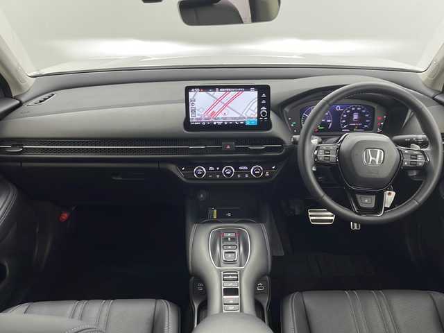 ホンダ ＺＲ－Ｖ ハイブリッド e:HEV Z 千葉県 2023(令5)年 1.7万km プラチナホワイトパール ホンダセンシング/・衝突軽減ブレーキ/・先行車発進お知らせ機能/・路外逸脱抑制/・標識認識機能/・車線維持支援システム/・誤発進抑制機能/・オートハイビーム/純正9インチナビ/・Bluetooth/・USB/・スマホ連携/・フルセグTV/BOSEプレミアムサウンドシステム(12スピーカー)/マルチビューカメラシステム/パワーバックドア/レーダークルーズコントロール/LEDオートライト/レザーシート/前席シートヒーター/メモリ機能付きパワーシート/純正18インチアルミホイール/置くだけ充電/ステアリングヒーター/パドルシフト/革巻きステアリング/スマートキー/プッシュスタート/ビルトインETC2.0