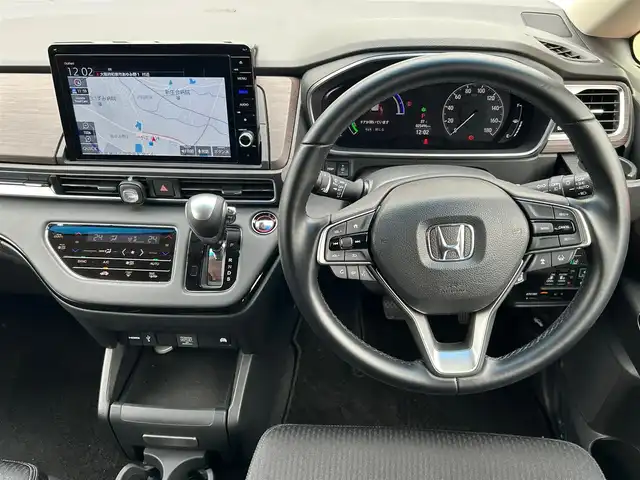 ホンダ オデッセイ ハイブリッド e:HEVアブソルート EX 大阪府 2022(令4)年 2.6万km プレミアムスパークルブラックパール 純正９インチナビ/　フルセグTV/CD/DVD/Bluetooth/USB/100V電源/全方位モニター/衝突軽減ブレーキ/横滑り防止装置/コーナーセンサー/ＢＳＭ/前席シートヒーター/両側パワースライドドア/レーダークルーズコントロール/レーンキープアシスト/電動リアゲート/前席パワーシート/オットマン/純正18インチアルミホイール/プッシュスタート/スマートキー/ＥＴＣ/ＬＥＤ