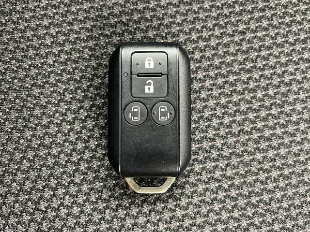 スズキ ワゴンＲ スマイル HYBRID S 鳥取県 2021(令3)年 2.7万km オフブルーメタリック/ホワイト2トーン ・４WD/・スズキ セーフティ サポート/・衝突被害軽減ブレーキ/・誤発進抑制機能、/逸脱警報機能/・純正9インチ　ナビ/・Bluetooth/CD/DVD/USB/フルセグTV/・AndroidAuto/AppleCarPlay/・アラウンドビューモニター/・両側パワースライドドア/・前席シートヒーター/・オートライト/・スマートキー/プッシュスタート/・レーンキープアシスト/・横滑り防止装置/・アイドリングストップ/・ETC