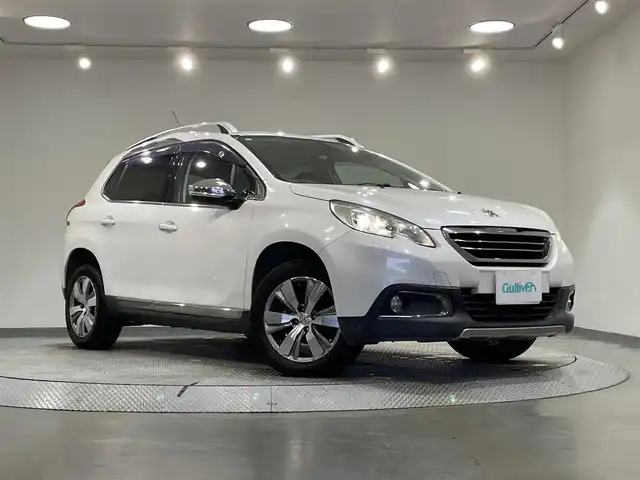 プジョー ２００８ プレミアム 愛知県 2015(平27)年 11.1万km パール Apple Car Play/・AM/FM/Bluetooth/バックカメラ/ハーフレザーシート/パドルシフト/オートライト/オートエアコン/ETC/ルーフレール/純正16インチアルミホイル/社外スタットレスタイヤ×4本/純正フロアマット/取扱説明書