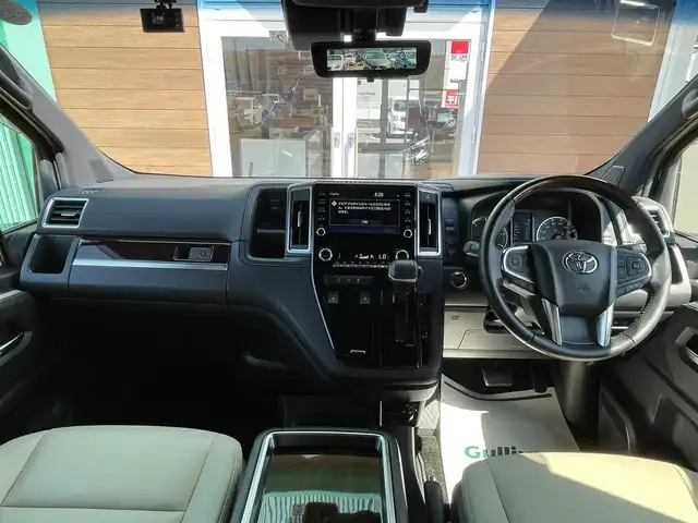 トヨタ グランエース プレミアム 宮崎県 2023(令5)年 2.5万km ブラック デジタルインナーミラー/純正ディスプレイオーディオ/フルセグTV/Bluetooth/パノラミックビューモニター/純正フリップダウンモニター/ビルトイン2.0ETC/純正17インチAW/トヨタセーフティセンス/ブラインドスポットモニター/レーダークルーズコントロール/前後コーナーセンサー/両側パワースライドドア/ベージュレザーシート/前席パワーシート/前席シートヒーター/純正フロアマット/オットマン/取扱説明書/保証書