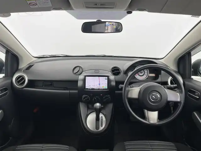 マツダ デミオ 13C スマートエディション 富山県 2010(平22)年 2.5万km ラディアントエボニーマイカ 社外ナビ（AM/FM/CD/ワンセグ）/ETC/純正フロアマット/ハロゲンライト/電動格納ミラー/リモコンキー/スペアキー/保証書/取扱説明書
