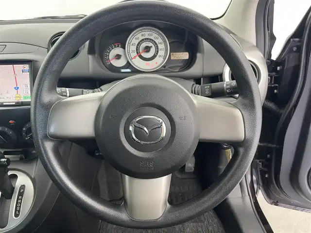 マツダ デミオ 13C スマートエディション 富山県 2010(平22)年 2.5万km ラディアントエボニーマイカ 社外ナビ（AM/FM/CD/ワンセグ）/ETC/純正フロアマット/ハロゲンライト/電動格納ミラー/リモコンキー/スペアキー/保証書/取扱説明書