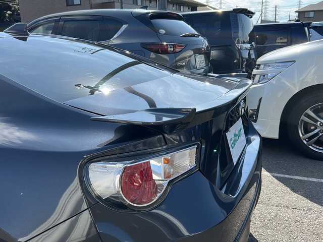 トヨタ ８６ GT リミテッド 茨城県 2014(平26)年 3.7万km ダークグレーメタリック ワンオーナー/リアスポイラー/社外メモリナビ【CN-RE04WD】/(地デジTV・CD・DVD・BT・ラジオ再生)/バックカメラ/オートライト/HIDヘッドライト/純正17inアルミホイール/フロアマット/スマートキー/取扱説明書/保証書