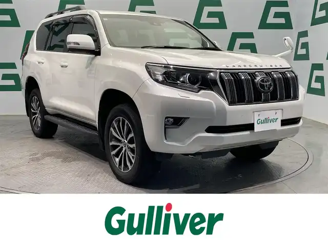トヨタ ランドクルーザー プラド TX Lパッケージ 鹿児島県 2020(令2)年 4.9万km ホワイトパールクリスタルシャイン 禁煙車/純正ナビ/(フルセグTV/Bluetooth/DVD/CD)/サンルーフ/バックカメラ/Toyota Safety Sense/　・プリクラッシュセーフティ/　・レーンディパーチャーアラート/　・オートマチックハイビーム/　・レーダークルーズコントロール（ブレーキ制御付）/レザーシート/前席シートヒーター/シートベンチレーション/前席パワーシート/ドライブレコーダー/ETC/純正アルミホイール/純正フロアマット/LEDヘッドライト