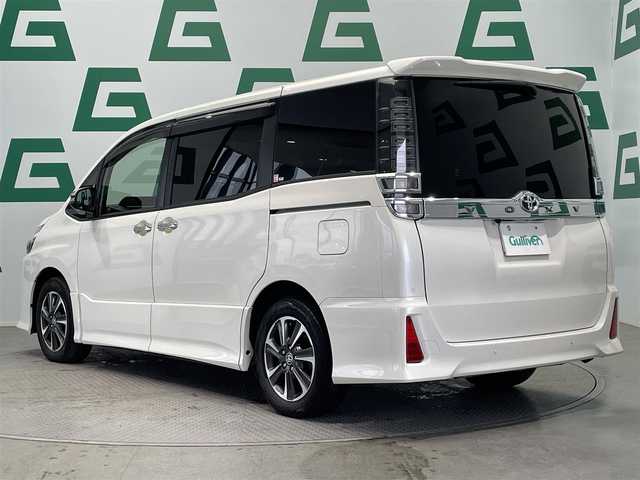 トヨタ ヴォクシー ZS 煌Ⅲ 鹿児島県 2021(令3)年 4.6万km ホワイトパールクリスタルシャイン ワンオーナー/禁煙車/トヨタセーフティ/コーナーセンサー/前後ドラレコ/バックカメラ/純正ナビ/オートライト/オートマチックハイビーム/ETC2.0/両側パワスラ/フリップダウンモニター/クルコン/LEDヘッドライト/プッシュスタート/革巻きステアリング/電格ミラー/スマートキー/スペアキー