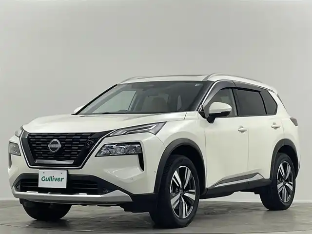 日産 エクストレイル G e－4ORCE 埼玉県 2024(令6)年 0.1万km ブリリアントホワイトパール ガラスルーフ　純正12.3型コネクトナビ　プロパイロット　全方位カメラ　デジタルインナーミラー　BSM　HUD　ワイヤレス充電　レザーシート　パワーシート　温シート　電動リアゲート　ハンドルヒーター