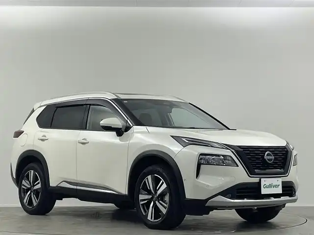 日産 エクストレイル G e－4ORCE 埼玉県 2024(令6)年 0.1万km ブリリアントホワイトパール ガラスルーフ　純正12.3型コネクトナビ　プロパイロット　全方位カメラ　デジタルインナーミラー　BSM　HUD　ワイヤレス充電　レザーシート　パワーシート　温シート　電動リアゲート　ハンドルヒーター