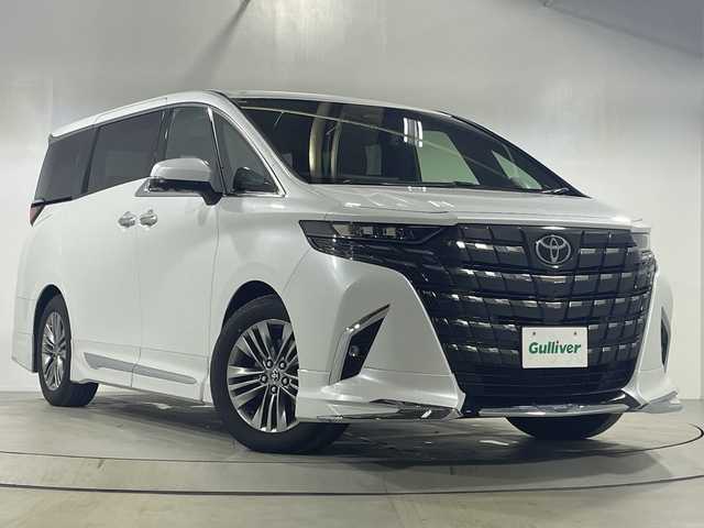 トヨタ アルファード Z 神奈川県 2025(令7)年 0.6万km プラチナホワイトパールマイカ ワンオーナー車/純正ナビ付ディスプレイオーディオ/Bluetooth・AM・FM・フルセグTV・HDMI・AppleCarPlay・AndroidAuto・Miracast/パノラミックビューモニター/モデリスタフルエアロ/両側パワースライドドア/トヨタセーフティセンス/クルーズコントロール/ブラインドスポットモニター/前側シートヒーター/前側パワーシート/運転席シートメモリー/ビルトインETC2.0/前後ドライブレコーダー/純正フロアマット/ステアリングスイッチ/パワーバックドア/デジタルインナーミラー/電動パーキングブレーキ/ブレーキオートホールド/プッシュスタート/スマートキー/スペアキー1本/取扱説明書/保証書/AC100V/置くだけ充電/パワーオットマン/キャプテンシート/LED3眼ヘッドライト/オートマチックアダプティブハイビーム/純正18インチアルミホイール/電動格納ミラー/プリクラッシュセーフティシステム/レーントレーシングアシスト/プロアクティブドライビングアシスト/ドライバー異常時対応システム