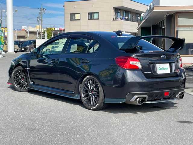 スバル ＷＲＸ ＳＴＩ STI 長野県 2016(平28)年 4万km ダークグレーメタリック 社外ナビ/6速MT/バックカメラ/プッシュスタート/ETC/オートライト/オートマチックハイビーム/ダウンヒルアシストコントロール/LEDヘッドライト/純正フロアマット/ドアバイザー/ローダウン/STIフルエアロパーツ/アンチグレアドアミラー/社外エアークリーナーHKS/社外タワーバーHKS/社外マフラーHKS/ドアモール、トランクスポイラー色あせ有