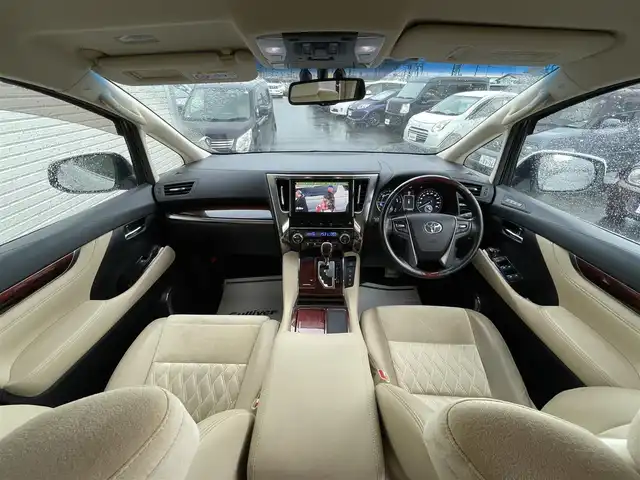 トヨタ アルファードハイブリット G 山形県 2016(平28)年 7.6万km ホワイトパールクリスタルシャイン 禁煙車/4WD/純正10インチナビ//フルセグ/CD/DVD/SD/AM//FM/iPod/BT/AUX/純正フリップダウンモニター/ハーフレザーシート/ETC/クルーズコントロール/プリクラッシュセーフティー/ステアリングスイッチ/オートLEDヘッドライト/オートワイパー/フォグランプ/プッシュスタート