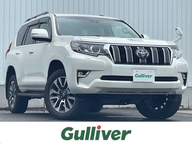 トヨタ ランドクルーザー プラド TX Lパッケージ 愛媛県 2022(令4)年 1.9万km ホワイトパールクリスタルシャイン Bluetooth接続/USB入力端子/ETC/バックカメラ/SDミュージックサーバー/フルセグTV/メモリナビ/DVD再生可能/サンルーフ/パワーシート/電動格納サードシート/シートヒーター/エアシート/ルーフレール/純正アルミホイール/白レザーシート/コンビハンドル/スペアタイヤ/追従走行付きクルーズコントロール/HDMI接続可能/ABS/横滑り防止装置/前後コーナーセンサー/レーンキープアシスト/盗難防止装置/オートマチックハイビーム/LEDヘッドライト/衝突被害軽減システム/カーテンエアバッグ