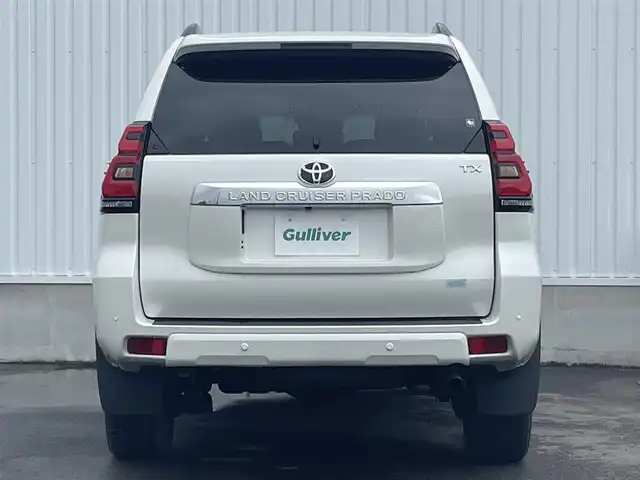 トヨタ ランドクルーザー プラド TX Lパッケージ 愛媛県 2022(令4)年 1.9万km ホワイトパールクリスタルシャイン Bluetooth接続/USB入力端子/ETC/バックカメラ/SDミュージックサーバー/フルセグTV/メモリナビ/DVD再生可能/サンルーフ/パワーシート/電動格納サードシート/シートヒーター/エアシート/ルーフレール/純正アルミホイール/白レザーシート/コンビハンドル/スペアタイヤ/追従走行付きクルーズコントロール/HDMI接続可能/ABS/横滑り防止装置/前後コーナーセンサー/レーンキープアシスト/盗難防止装置/オートマチックハイビーム/LEDヘッドライト/衝突被害軽減システム/カーテンエアバッグ