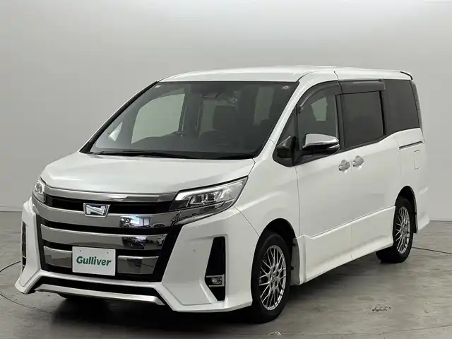 トヨタ ノア ハイブリッド Si ダブルバイビーⅢ 福岡県 2020(令2)年 6.9万km ホワイトパールクリスタルシャイン ワンオーナー　/純正ナビ／フルセグＴＶ　/バックカメラ　/クルーズコントロール　/コーナーセンサー　/衝突軽減　/レーンキープ　/アクセル踏み間違い防止　/両側電動スライドドア　/ハーフレザー　/シートヒーター　/ＬＥＤ