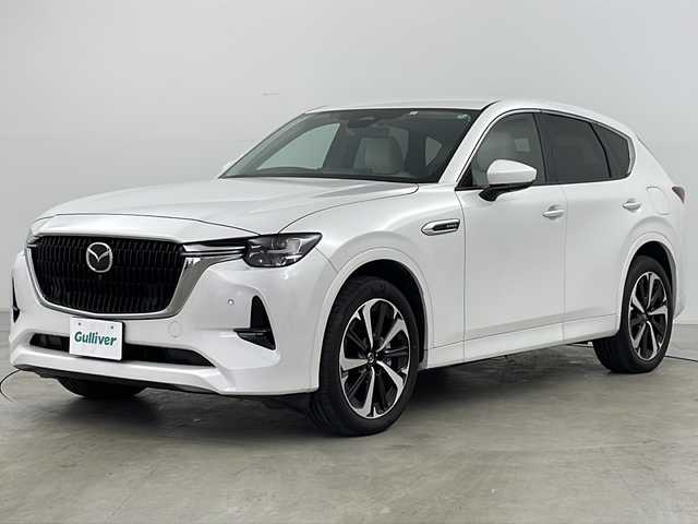 マツダ ＣＸ－６０ ＰＨＥＶ エクスクルーシブモダン 道央・札幌 2023(令5)年 1.2万km ロジウムホワイトプレミアムメタリック ・4WD/・PHEV/・寒冷地仕様/・純正SDナビ&フルセグTV&DVD&BT&AppleCarPlay&AndroidAuto/・スマートブレーキサポート/・レーンキープアシスト/・誤発進抑制制御機能/・標識認識システム/・ブラインドスポットモニター/・パーキングセンサー/・クルーズコントロール/・全方位カメラ/・ヘッドアップディスプレイ/・アルパインフリップダウンモニター/・BOSEサウンドシステム/・純正ドライブレコーダー/・パワーバックドア/・レザーシート/・パワーシート/・エアシート/・シートヒーター/・ミラーヒーター/・ハンドルヒーター/・革巻きステアリング/・パドルシフト/・ステアリングスイッチ/・オートワイパー/・フロントワイパーデアイサー/・置くだけ充電/・AC100V/・ビルトインETC/・オートマチックハイビーム/・オートライト/・LEDヘッドライト/・Mi DRIVE/・ダウンヒルアシストコントロール/・横滑り防止/・プッシュスタート/・スマートキー