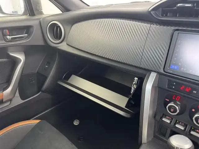 トヨタ ８６ GT リミテッド 愛知県 2015(平27)年 1.2万km オレンジメタリック GTリミテッド/革巻きステアリング/ハーフレザーシート/純正ナビ/（CD/ラジオ/BT/ワンセグ）/純正リアスポイラー/AT/DNシートヒーター/クルコン/バックカメラ/ETC/横滑り防止/VSC　SPORT/SNOWモード/ドアバイザー/デュアルエアコン/スペアキー