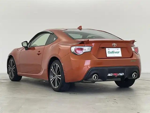 トヨタ ８６ GT リミテッド 群馬県 2015(平27)年 1.2万km オレンジメタリック 純正SDナビ 　＜NSCP-W64＞/（CD/ラジオ/Bluetooth/ワンセグTV）/バックカメラ/ETC/純正リアスポイラー/クルーズコントロール/D/N席シートヒーター/ハーフレザーシート/走行制御モードスイッチ（スポーツ/スノー）/VSC（ビークルスタビリティコントロール）/パドルシフト/革巻きステアリング/デュアルエアコン/ドアバイザー