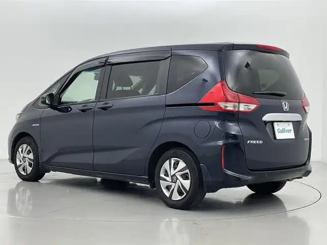 ホンダ フリード ハイブリット G ホンダセンシング 熊本県 2019(令1)年 5.8万km ミッドナイトブルービームM 社外8インチナビ（ＣＤ・ＤＶＤ・フルセグ・ＢＴ・ＵＳＢ・ｉｐｏｄ）/バックカメラ　/前後ドライブレコーダー　/ビルトインＥＴＣ　/レーダークルーズコントロール/両側パワースライドドア　/後ろのみクリアランスソナー/ホンダセンシング　/衝突軽減ブレーキ　/レーンキープアシスト/横滑り防止/アイドリングストップ/純正フロアマット/純正１５インチAW/オートライト/LEDヘッドライト/スマートキー/プッシュスタート/スペアキー1本/保証書/取扱説明書