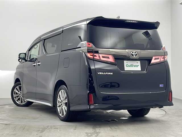 トヨタ ヴェルファイア ゴールデンアイズⅡ 愛知県 2021(令3)年 3.9万km ブラック 純正９インチナビ（CD/DVD/BT）/純正フリップダウンモニター/サンルーフ/取扱説明書/100V充電/スマートキー/スペアキー１本/Wオートエアコン/クルーズコントロール/USB入力端子/純正ETC2.0/バックカメラ/三列シート/オットマン/電動リアゲート/ドライブレコーダー前後/ウォークスルー/フロアマット/ハーフレザー/両側パワースライドドア/純正18インチアルミホイール/ABS/横滑り防止装置/コーナーセンサー前後/レーンキープアシスト/オートライト/オートマチックハイビーム/三眼LEDヘッドライト/W+サイドエアバック/衝突軽減システム/カーテンエアバック/BSM(ブラインドスポットモニター)