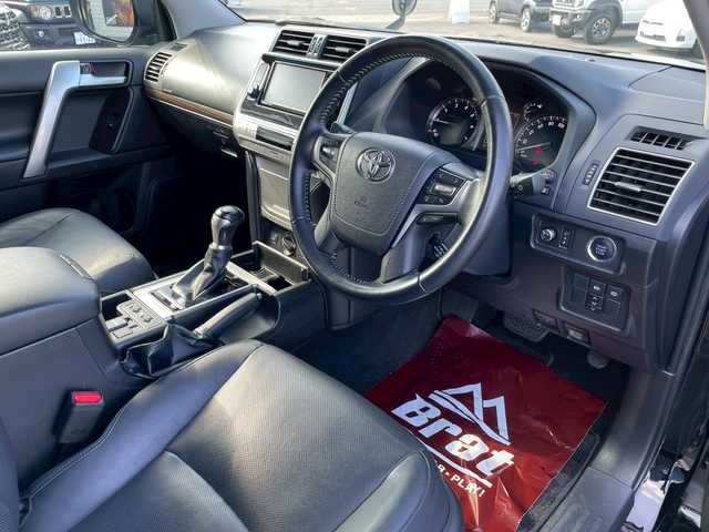 トヨタ ランドクルーザー プラド TX Lパッケージ 宮崎県 2018(平30)年 5.4万km 黒 社外SDナビ　/フルセグ　/バックカメラ　/ETC　/ドラレコ　/レザーシート　/クルコン　/サンルーフ　/衝突被害軽減ブレーキ　/横滑り防止　/レーンキープ　/純正ドアバイザー　/フォグランプ　/LED　/Bluetooth　/サイドステップ