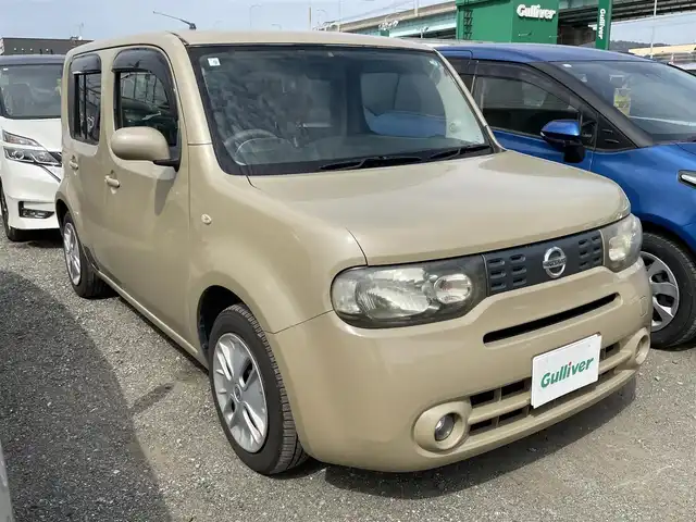 日産 キューブ 15X Vセレクション 福岡県 2009(平21)年 12万km クラフトダンボール 社外7型メモリーナビ/（フルセグTV/CD/DVD）/ETC/オートエアコン/スマートキー/Pスタート/フォグランプ/スマートキー連動電格ミラー/フロアマット純正運転席のみあり他欠品/運転席側ウィンドウスイッチ不調