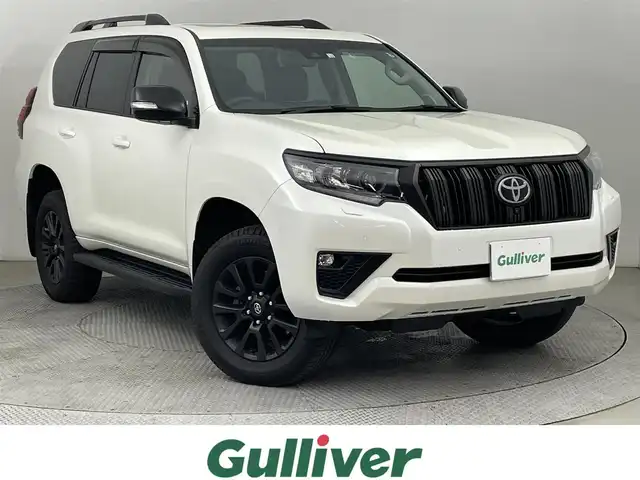 トヨタ ランドクルーザー プラド TX Lパッケージ マットブラED 道央・札幌 2022(令4)年 2.8万km ホワイトパールクリスタルシャイン ・4WD/・純正ディスプレイオーディオ/・フルセグ/applecarplay/androidauto/BT//・全方位カメラ/・プリクラッシュ/・アダプティブクルーズコントロール/・レーンキープアシスト/・クリアランスソナー/・ブラインドスポットモニター/・ルーフレール/・シートエアコン/ヒーター/・パワーシート/・レザーシート/・オートライト/・オートマチックハイビーム/・ヘッドライトウォッシャー/・スマートキー/・プッシュスタート/・純正フロアマット/・純正エンジンスターター/・積込社外ＡＷ＋冬タイヤ(DM-V3 265/65/17)