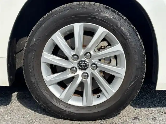 トヨタ ノア ハイブリッド Z 茨城県 2022(令4)年 7万km ホワイトパールクリスタルシャイン 純正10.5インチディスプレイオーディオプラス/　(AM/FM/CD/USB/フルセグ)/バックカメラ/前後ドライブレコーダー/14型有機EL後席ディスプレイ/ブラインドスポットモニター/快適利便パッケージ/トヨタセーフティセンス（衝突回避支援パッケージ）/ETC2.0/LEDヘッドライト/ハーフレザーシート/1&2列目シートヒーター/オットマン/W(後席)エアコン/前後コーナーセンサー/レーンキープアシスト/オートライト/ステアリングヒーター/純正アルミホイール