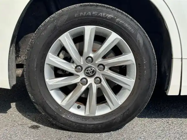 トヨタ ノア ハイブリッド Z 茨城県 2022(令4)年 7万km ホワイトパールクリスタルシャイン 純正10.5インチディスプレイオーディオプラス/　(AM/FM/CD/USB/フルセグ)/バックカメラ/前後ドライブレコーダー/14型有機EL後席ディスプレイ/ブラインドスポットモニター/快適利便パッケージ/トヨタセーフティセンス（衝突回避支援パッケージ）/ETC2.0/LEDヘッドライト/ハーフレザーシート/1&2列目シートヒーター/オットマン/W(後席)エアコン/前後コーナーセンサー/レーンキープアシスト/オートライト/ステアリングヒーター/純正アルミホイール