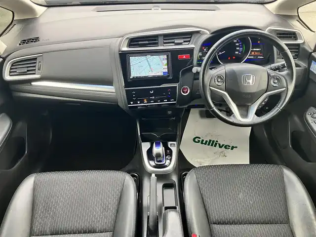 ホンダ フィット ハイブリット Lパッケージ 静岡県 2014(平26)年 7.9万km アラバスターシルバーメタリック エンジンスタートボタン/パワーステアリング/パワーウィンドウ/アイドリングストップ/スマートキー/スペアキー1本/オートエアコン/クルーズコントロール/ETC/ドライブレコーダー/SDナビ（CD/DVD/フルセグ）/純正フロアマット/ハーフレザーシート/ABS/横滑り防止装置/オートライト/LEDヘッドライト/Wエアバッグ