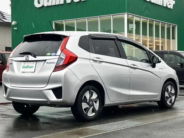 ホンダ フィット ハイブリット Lパッケージ 静岡県 2014(平26)年 7.9万km アラバスターシルバーメタリック エンジンスタートボタン/パワーステアリング/パワーウィンドウ/アイドリングストップ/スマートキー/スペアキー1本/オートエアコン/クルーズコントロール/ETC/ドライブレコーダー/SDナビ（CD/DVD/フルセグ）/純正フロアマット/ハーフレザーシート/ABS/横滑り防止装置/オートライト/LEDヘッドライト/Wエアバッグ