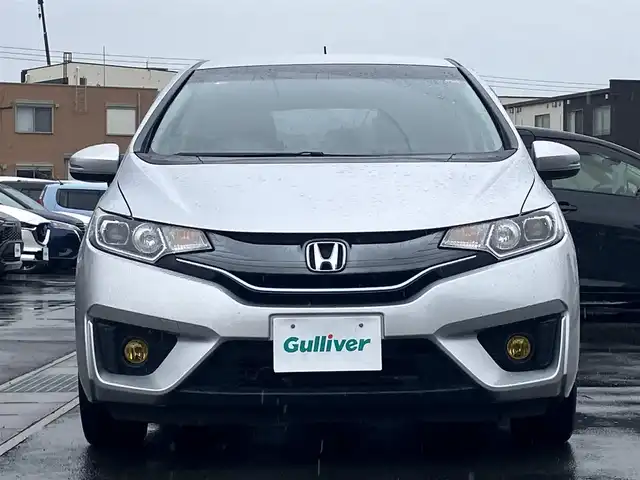 ホンダ フィット ハイブリット Lパッケージ 静岡県 2014(平26)年 7.9万km アラバスターシルバーメタリック エンジンスタートボタン/パワーステアリング/パワーウィンドウ/アイドリングストップ/スマートキー/スペアキー1本/オートエアコン/クルーズコントロール/ETC/ドライブレコーダー/SDナビ（CD/DVD/フルセグ）/純正フロアマット/ハーフレザーシート/ABS/横滑り防止装置/オートライト/LEDヘッドライト/Wエアバッグ