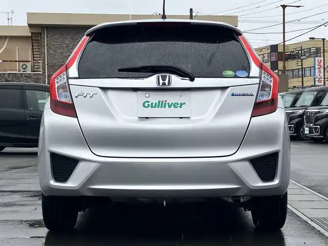 ホンダ フィット ハイブリット Lパッケージ 静岡県 2014(平26)年 7.9万km アラバスターシルバーメタリック エンジンスタートボタン/パワーステアリング/パワーウィンドウ/アイドリングストップ/スマートキー/スペアキー1本/オートエアコン/クルーズコントロール/ETC/ドライブレコーダー/SDナビ（CD/DVD/フルセグ）/純正フロアマット/ハーフレザーシート/ABS/横滑り防止装置/オートライト/LEDヘッドライト/Wエアバッグ