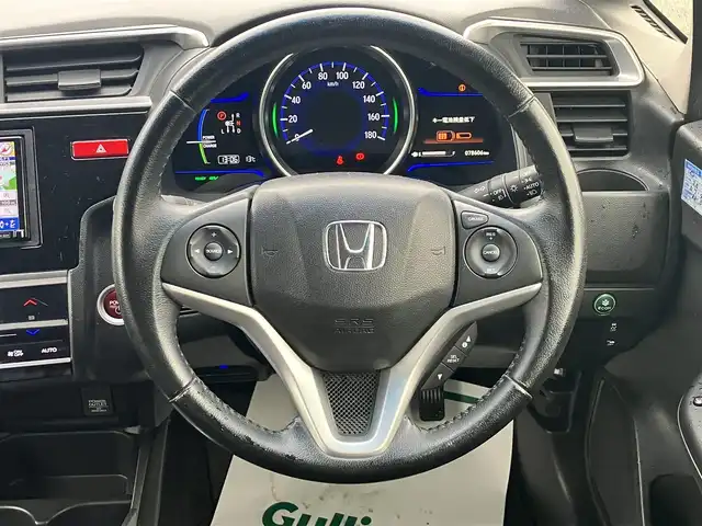 ホンダ フィット ハイブリット Lパッケージ 静岡県 2014(平26)年 7.9万km アラバスターシルバーメタリック エンジンスタートボタン/パワーステアリング/パワーウィンドウ/アイドリングストップ/スマートキー/スペアキー1本/オートエアコン/クルーズコントロール/ETC/ドライブレコーダー/SDナビ（CD/DVD/フルセグ）/純正フロアマット/ハーフレザーシート/ABS/横滑り防止装置/オートライト/LEDヘッドライト/Wエアバッグ