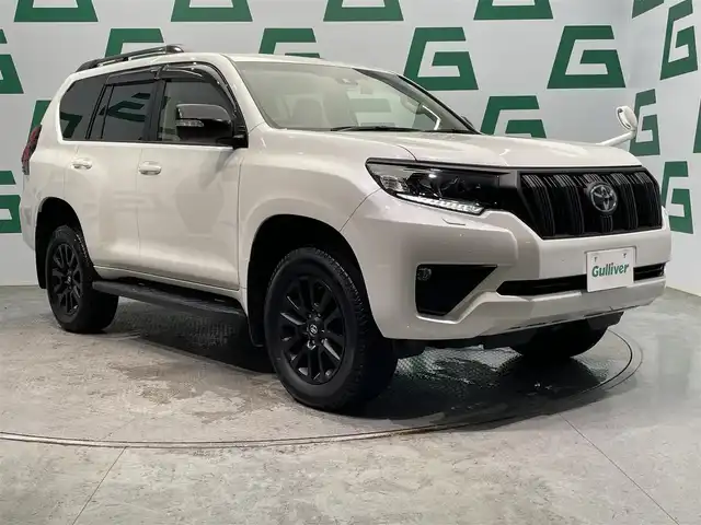 トヨタ ランドクルーザー プラド TX Lパッケージ マットブラED 鹿児島県 2022(令4)年 2.4万km ホワイトパールクリスタルシャイン 純正ナビ【ＮＳＺＴ－Ｙ６８Ｔ】　/バックカメラ　/トヨタセーフティセンス　/革巻きステアリング　/ステアリングリモコン　/LEDヘッドライト　/フロントフォグライト　/電動格納ミラー　/純正ドアバイザー　/ＥＴＣ/前後ドライブレコーダー/禁煙車
