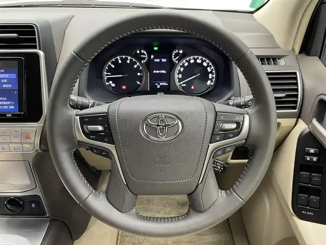トヨタ ランドクルーザー プラド TX Lパッケージ マットブラED 鹿児島県 2022(令4)年 2.4万km ホワイトパールクリスタルシャイン 純正ナビ【ＮＳＺＴ－Ｙ６８Ｔ】　/バックカメラ　/トヨタセーフティセンス　/革巻きステアリング　/ステアリングリモコン　/LEDヘッドライト　/フロントフォグライト　/電動格納ミラー　/純正ドアバイザー　/ＥＴＣ/前後ドライブレコーダー/禁煙車