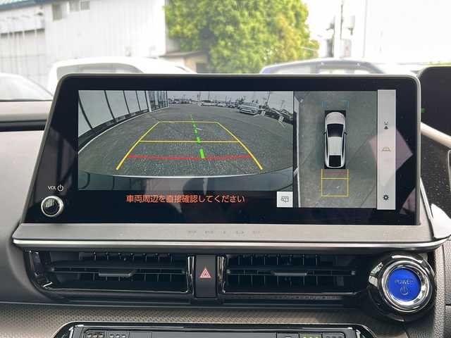 トヨタ プリウス Z 山形県 2024(令6)年 1.1万km プラチナホワイトパールマイカ レーダークルーズコントロール/純正12.3インチナビ/（Bluetooth/フルセグ)/全方位カメラ/電動パーキングブレーキ/置くだけ充電/本革ステアリング/BSM/寒冷地仕様/ガラスルーフ/DN席エアシート/DN席シートヒーター/DN席パワーシート/メモリシート/ビルトインETC2.0/純正フロアマット