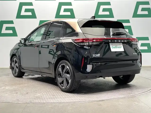日産 オーラ G 鹿児島県 2022(令4)年 1万km ミッドナイトブラック/サンライズカッパー 禁煙　/衝突軽減　/追従型クルーズコントロール　/全方位カメラ　/デジタルインナーミラー　/前後コーナーセンサー　/革巻きステアリング　/ブラインドスポットモニター　/電動パーキングブレーキ/オートブレーキホールド　/オートライト/オートマチックハイビーム/取扱説明書/保証書