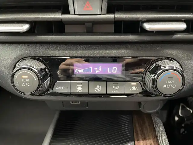 日産 オーラ G 鹿児島県 2022(令4)年 1万km ミッドナイトブラック/サンライズカッパー 禁煙　/衝突軽減　/追従型クルーズコントロール　/全方位カメラ　/デジタルインナーミラー　/前後コーナーセンサー　/革巻きステアリング　/ブラインドスポットモニター　/電動パーキングブレーキ/オートブレーキホールド　/オートライト/オートマチックハイビーム/取扱説明書/保証書