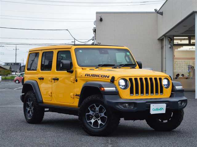 クライスラー・ジープ ジープ ラングラー アンリミテッド ルビコン スカイワンタッチパワートップ 栃木県 2019(令1)年 7万km 黄 イエロー49台限定車/電動開閉式ルーフ/4WD/純正ナビ/[AM/FM/BT/AUX/USB/ワンセグ]/衝突被害軽減ブレーキ/BSM/ACC/フロント＆リアパークアシスト/ヒルスタートアシスト/ヒルディセントコントロール/前席シートヒーター/ステアリングヒーター/バックカメラ/ETC/前後ドラレコ一体型デジタルインナーミラー/AC１１５V/LEDヘッドライト/フォグランプ/オートライト/スマートスペアキー×１/保証書/取扱説明書/カラーコードPYV(ヘラヤライエロー)