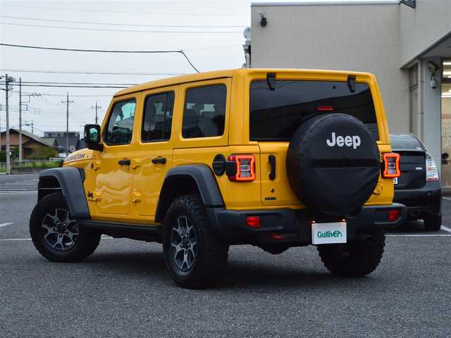 クライスラー・ジープ ジープ ラングラー アンリミテッド ルビコン スカイワンタッチパワートップ 栃木県 2019(令1)年 7万km 黄 イエロー49台限定車/電動開閉式ルーフ/4WD/純正ナビ/[AM/FM/BT/AUX/USB/ワンセグ]/衝突被害軽減ブレーキ/BSM/ACC/フロント＆リアパークアシスト/ヒルスタートアシスト/ヒルディセントコントロール/前席シートヒーター/ステアリングヒーター/バックカメラ/ETC/前後ドラレコ一体型デジタルインナーミラー/AC１１５V/LEDヘッドライト/フォグランプ/オートライト/スマートスペアキー×１/保証書/取扱説明書/カラーコードPYV(ヘラヤライエロー)