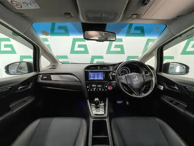 ホンダ シャトル ハイブリッド Z ホンダセンシング 鹿児島県 2021(令3)年 4.7万km プレミアムベルベットパープル・パール 禁煙車　/純正ナビ(CD/DVD/Bluetooth/フルセグTV)　/バックカメラ　/ホンダセンシング　/衝突軽減　/横滑り防止機能　/追従型クルーズコントロール　/ＬＥＤヘッドライト　/オートライト　/オートマチックハイビーム/ＥＴＣ　/純正フロアマット　/純正アルミホイール　/ドアバイザー/電格ミラー