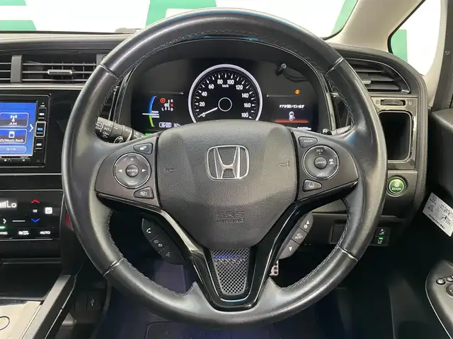 ホンダ シャトル ハイブリッド Z ホンダセンシング 鹿児島県 2021(令3)年 4.7万km プレミアムベルベットパープル・パール 禁煙車　/純正ナビ(CD/DVD/Bluetooth/フルセグTV)　/バックカメラ　/ホンダセンシング　/衝突軽減　/横滑り防止機能　/追従型クルーズコントロール　/ＬＥＤヘッドライト　/オートライト　/オートマチックハイビーム/ＥＴＣ　/純正フロアマット　/純正アルミホイール　/ドアバイザー/電格ミラー