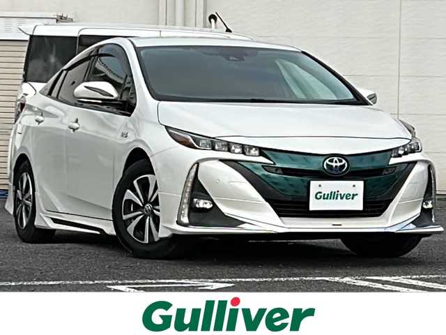 トヨタ プリウス ＰＨＶ A レザーパッケージ 千葉県 2017(平29)年 13.2万km ホワイトパールクリスタルシャイン モデリスタエアロ　１１．６型メーカーナビ　バックカメラ　レザーシート　２．０ＥＴＣ　ステアヒーター　シートヒーター　パーキングアシスト　セーフティセンス　インテリジェントソナー　ＢＳＭ スマートキー
