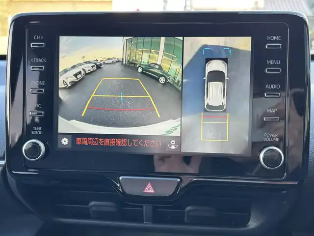 トヨタ ヤリスクロス ハイブリッド Z 島根県 2023(令5)年 1.7万km プラチナホワイトパールマイカ 登録時走行距離　16129km/取扱説明書/保証書/純正ナビ(Bluetooth/AM/FM)/フルセグテレビ/バックカメラ（フロント・サイド・バック）/ヘッドアップディスプレイ/パワーシート（D席）/シートヒーター（DN席）/ステアリングヒーター/ハンズフリーパワーバックドア/オートマチックハイビーム/レーントレーシングアシスト/プリクラッシュセーフティシステム/ブラインドスポットモニター/リヤクロストラフィックアラート/パーキングサポートブレーキ/ロードサインアシスト/ETC/純正アルミ１８インチ