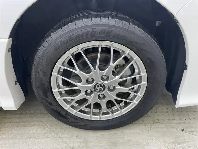 トヨタ ヴォクシー ハイブリッド ZS 煌Ⅲ 岡山県 2021(令3)年 5万km ホワイトパールクリスタルシャイン 純正ナビ/（CD/BT/AUX)/衝突軽減ブレーキ/両側パワースライドドア/ビルトインＥＴＣ/シートヒーター（D/N席）/ハーフレザーシート/ＬＥＤヘッドライト/オートハイビーム/オートライト/LEDフォグランプ/バックカメラ/コーナーセンサー/プッシュスタート/クルーズコントロール/アイドリングストップ/レーンキープアシスト/純正16AW/スマートキー×1/踏み間違い防止/ISOFIX/後席サンシェイド/ステアリングスイッチ/チルトステアリング/充電用USB/シートリフター/シートバックテーブル/ウインカーミラー/ドアバイザー/新車保証書/取扱説明書